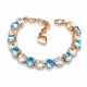 Aproce „Tev II (Aquamarine Blue / Crystal)“ ar Swarovski® kristāliem