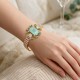 Aproce „Aurora (Soft Mint Ignite / Moonlight / Reinvented Peridot / Aurora Boreale)“ ar Swarovski™ kristāliem