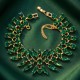 Aproce „Kristāla kārdinājums (Emerald)“ ar Preciosa® kristāliem