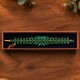 Aproce „Kristāla kārdinājums (Emerald)“ ar Preciosa® kristāliem