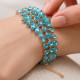 Aproce „Kristāla kārdinājums (Aqua Bohemica)“ ar Preciosa® kristāliem